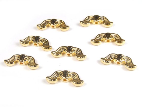 Engelsflügel goldfarben – 19 × 7,5 × 3,5 mm