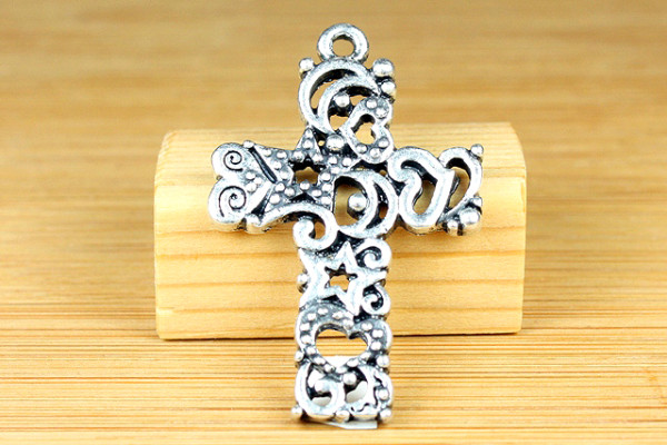 Anhänger, Kreuz mit Sternen und Herzchen, 38x25mm